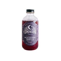 Bottle of Crescent Simples Blackberry Simple Syrup on a white background