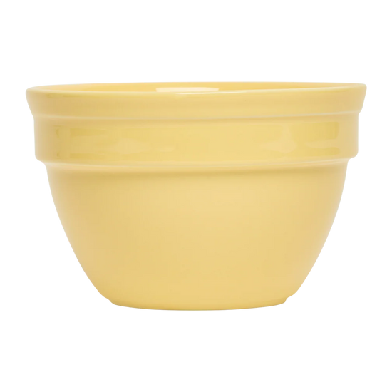 Yellow ceramic bowl on a white background