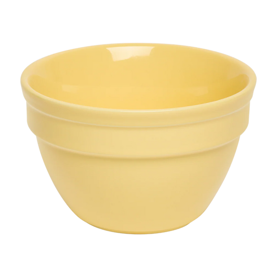Yellow ceramic bowl on a white background