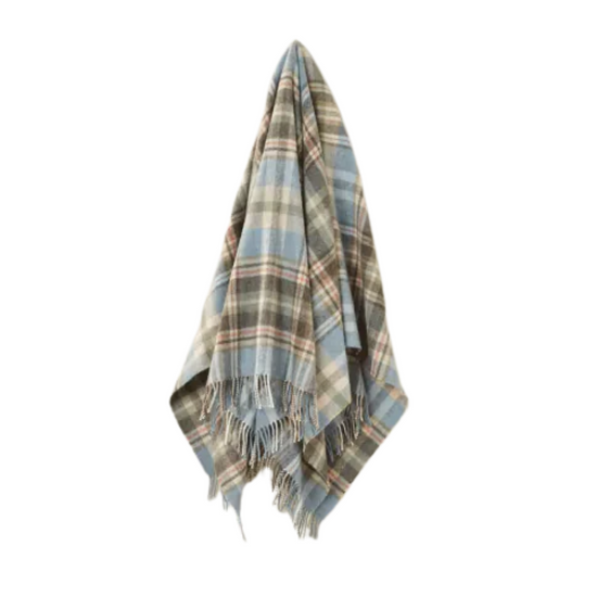 Plaid blanket with fringes on a white background