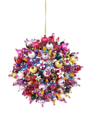 Colorful beaded ornament hanging against a white background
