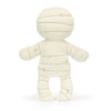 Toy mummy plush figure on a white background