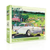 Jigsaw puzzle box titled 'On the Green' with a vintage car and golf scene on a white background.