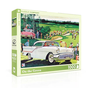 Jigsaw puzzle box titled 'On the Green' with a vintage car and golf scene on a white background.