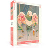 Jigsaw puzzle box with artwork of a bird and baby chick, featuring 'New York Puzzle Company' branding.