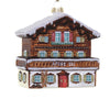 Decorative ornament of a snowy chalet with 'Apres Ski' text on a white background