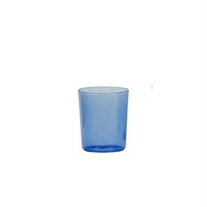 Blue glass tumbler on a white background