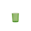 Green glass tumbler on a white background