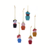 Set of colorful ornaments shaped like small figures on a white background