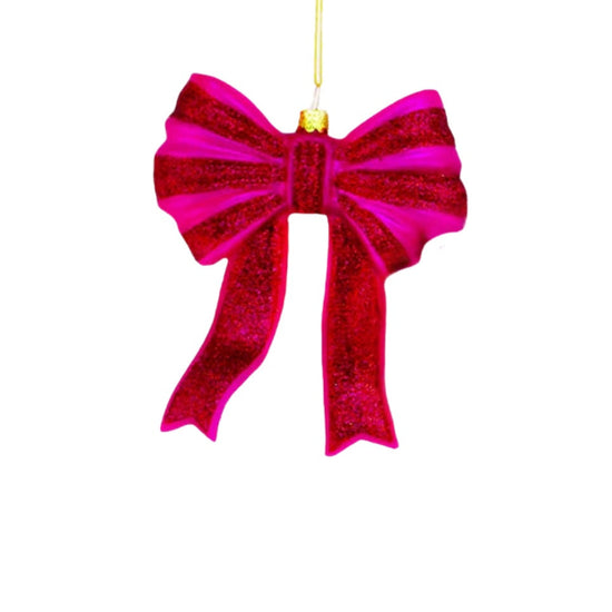 Red glittery bow ornament on a white background